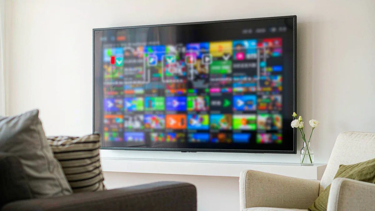 A TV showing a streaming channel guide grid