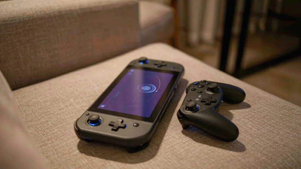 Handheld game console on a sofa showing a settings menu